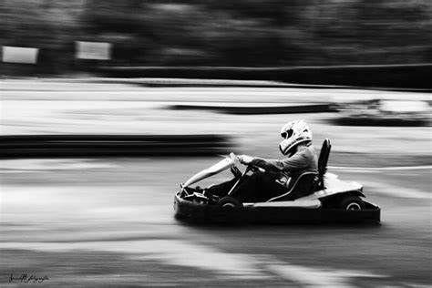Black and White young Karting driver